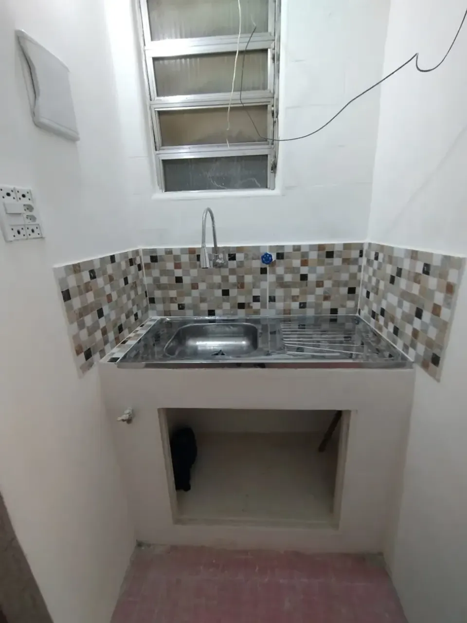 Unfurnished studio with 1 bedroom and wood floors