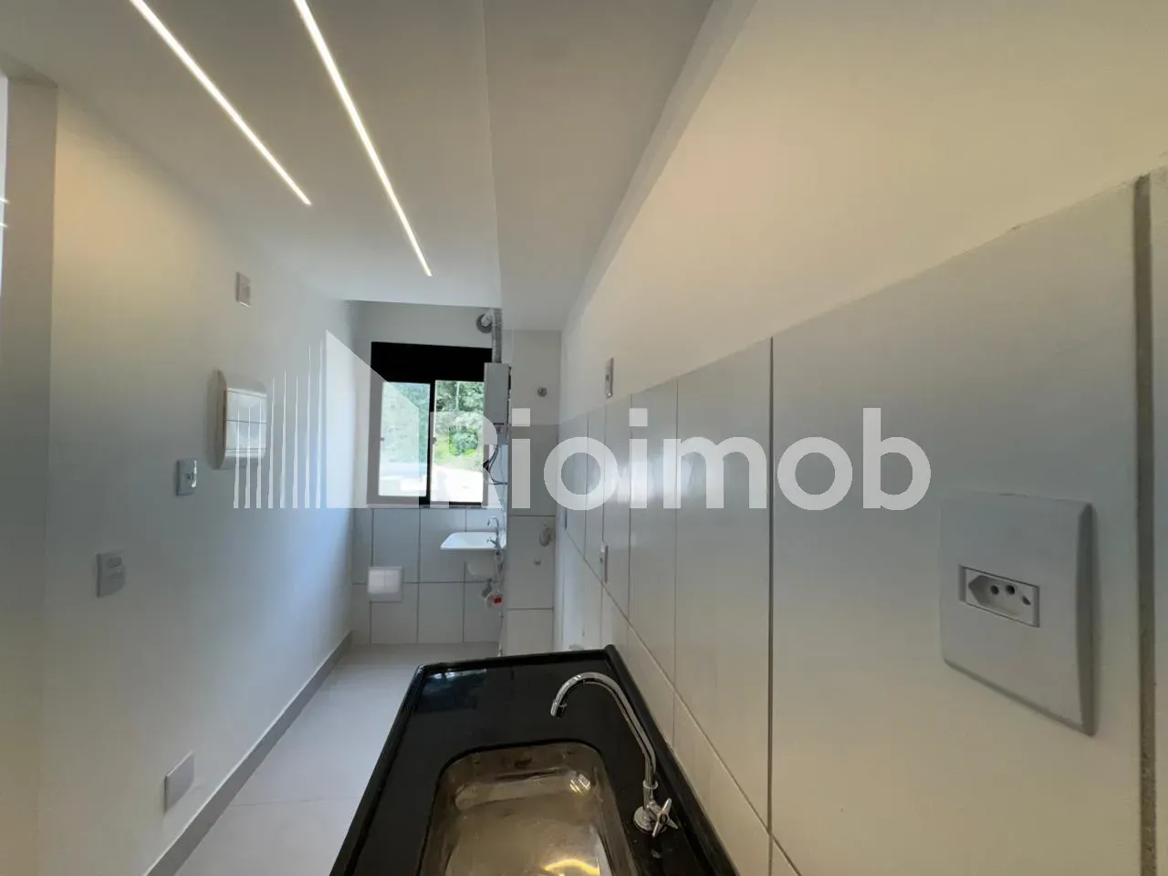 2-bedroom apartment with an open-plan kitchen — photo 19