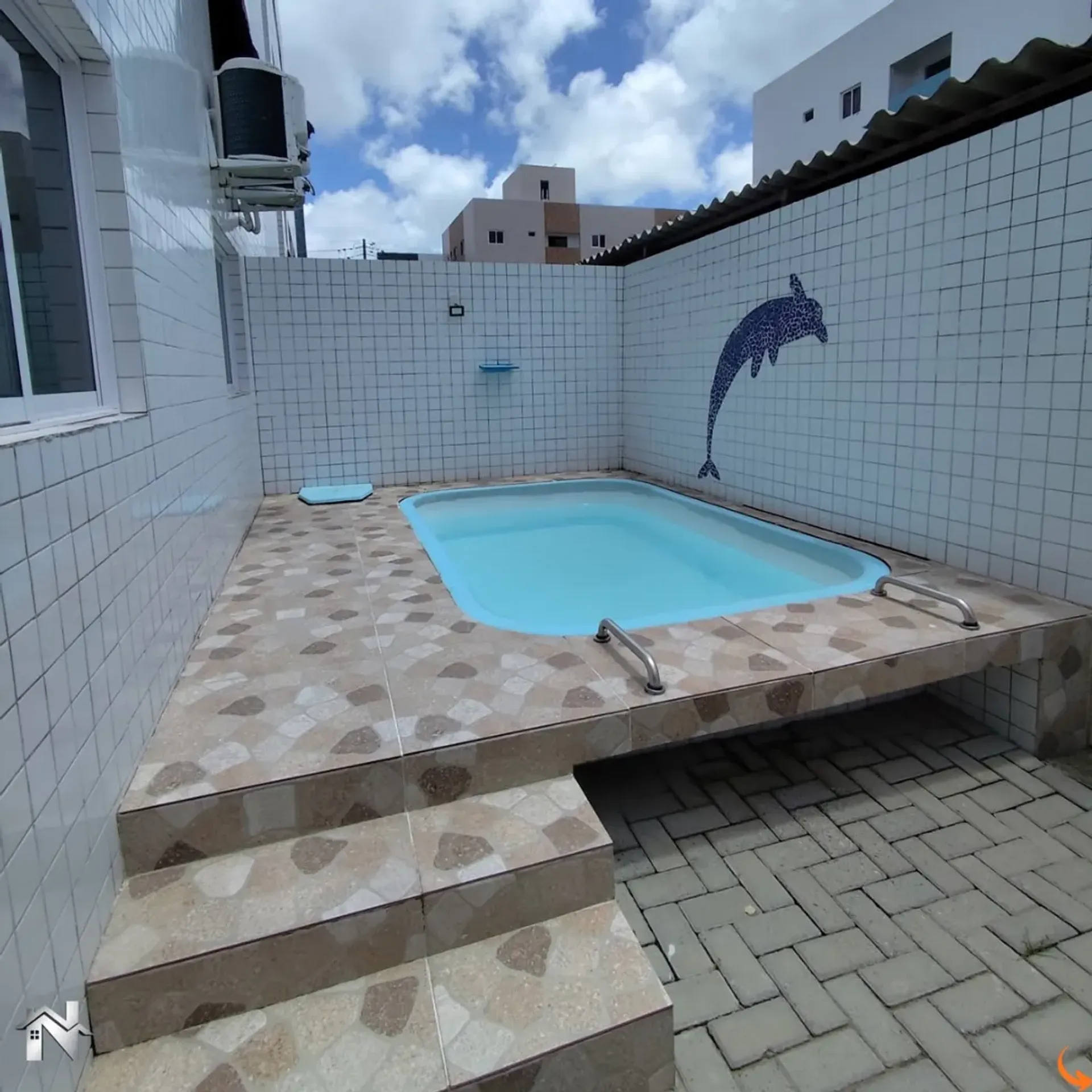 2-bedroom apartment in a building with a pool — photo 11