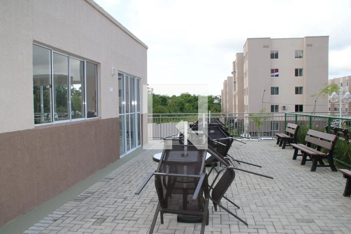 2-bedroom apartment in a building with a pool