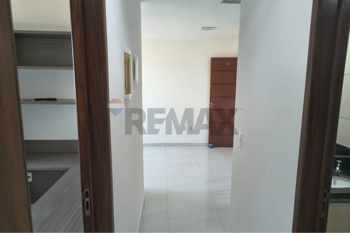 2-bedroom apartment in a building with a pool — photo 10