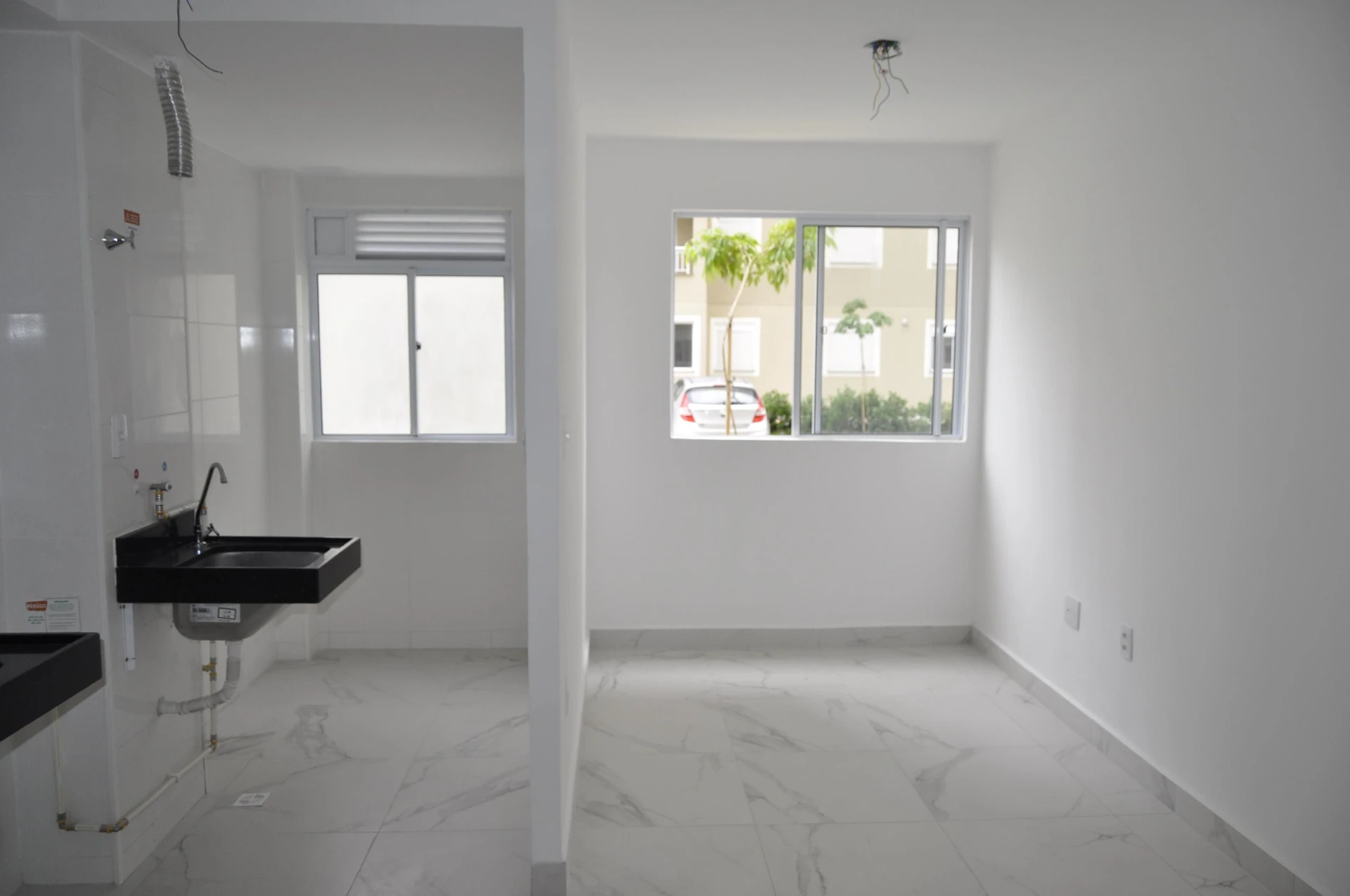 2-bedroom apartment in a building with a pool — photo 2