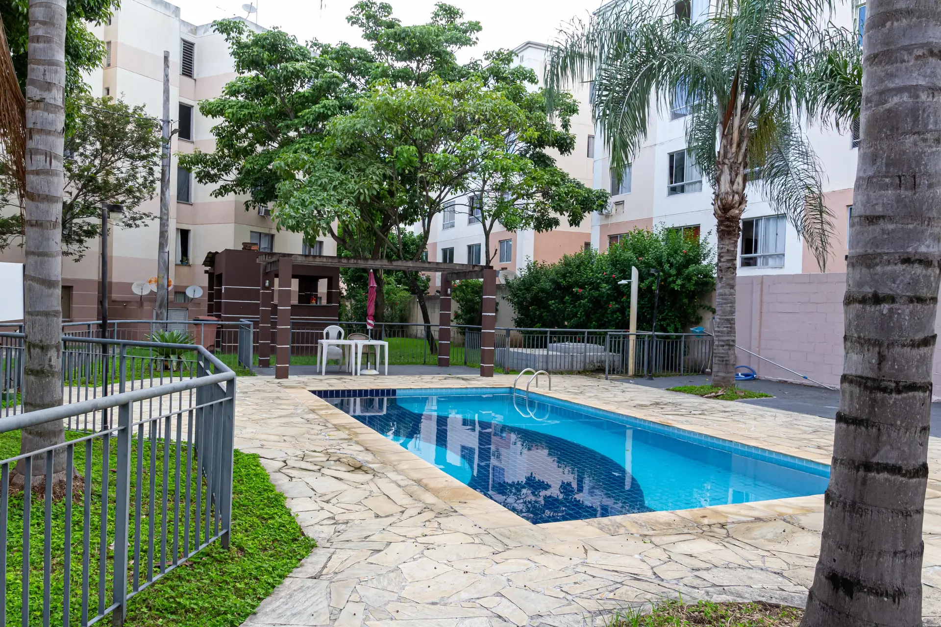 2-bedroom apartment in a building with a pool — photo 9