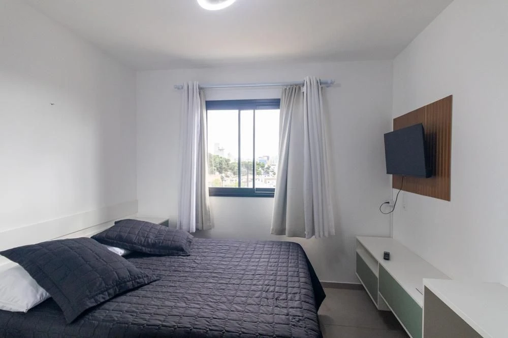 Furnished studio with 1 bedroom and glass balcony