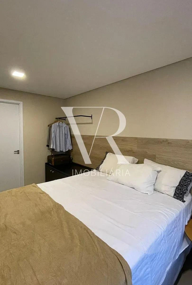 2-bedroom apartment in a building with a pool — photo 12