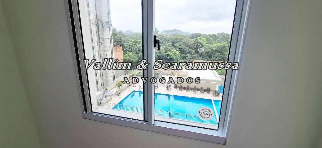 2-bedroom apartment in a building with a pool — photo 14