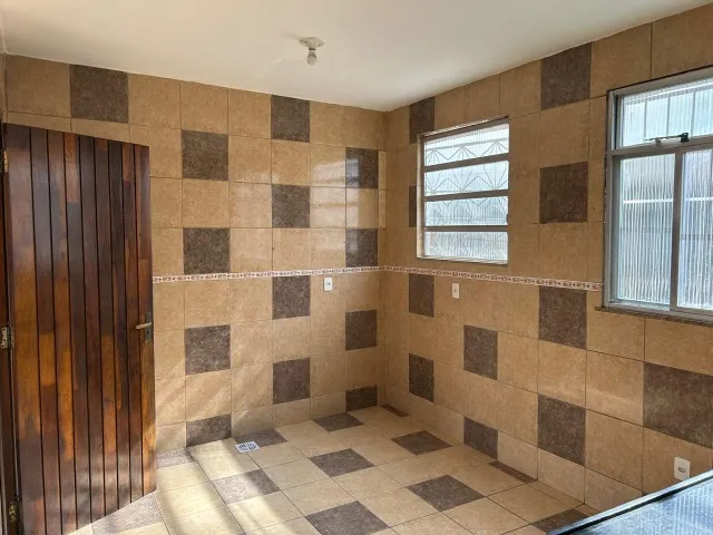 Casa sem mobília com cozinha fechada e terraço — photo 19