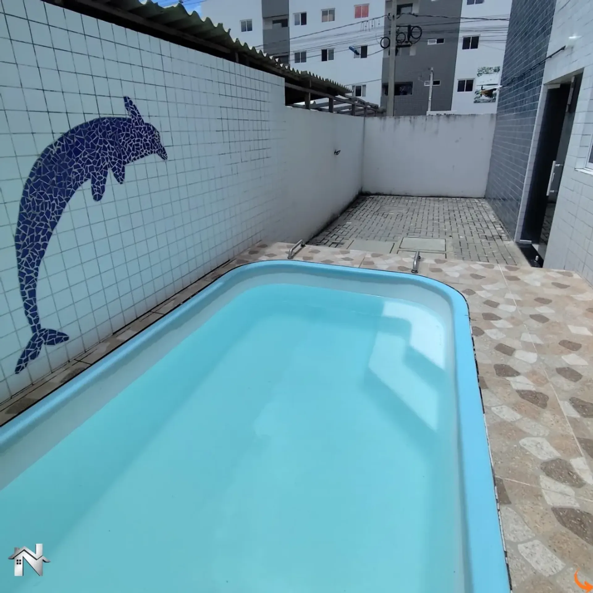 2-bedroom apartment in a building with a pool — photo 4