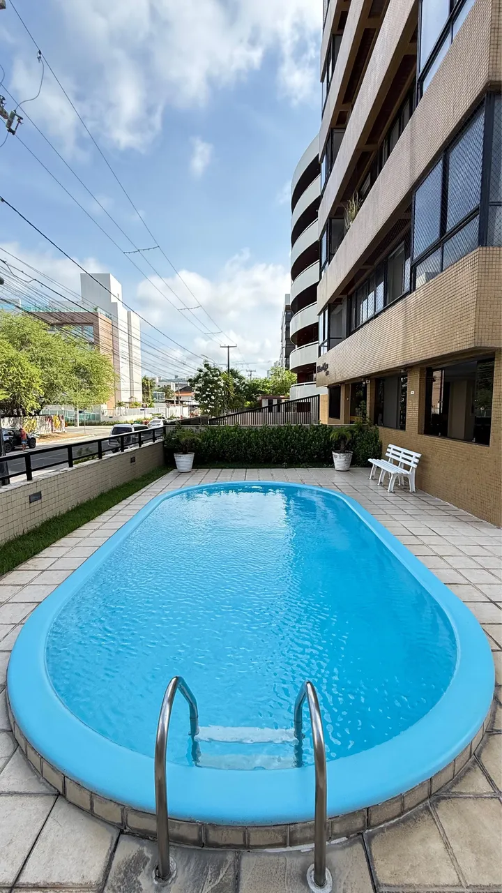 3-bedroom apartment in a building with a pool — photo 4