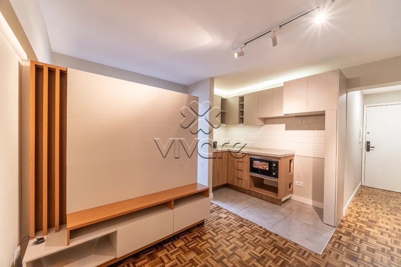 1-bedroom apartment with open-plan kitchen and electric oven — photo 4