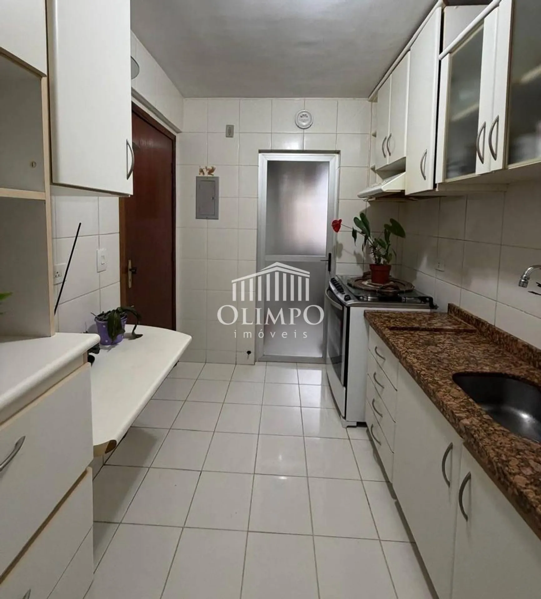 2-bedroom apartment in a building with a pool — photo 2