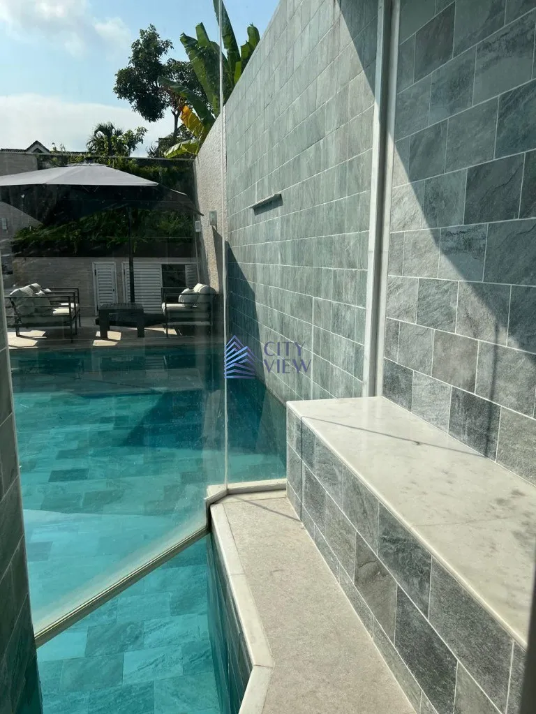 Casa com 3 dormitórios e 4 banheiros de 400 m² — photo 34