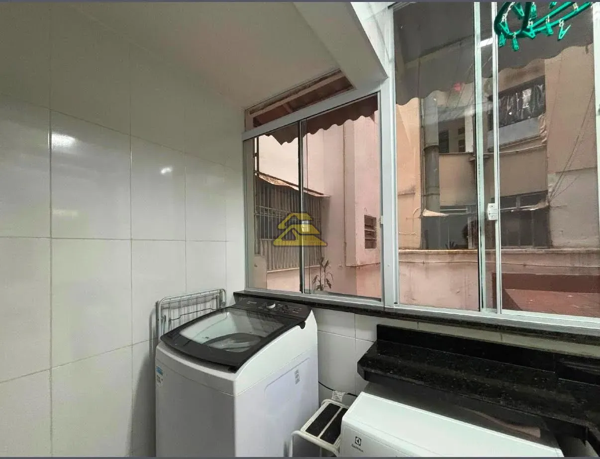 3-bedroom apartment with wall TV unit and tile floors — photo 26