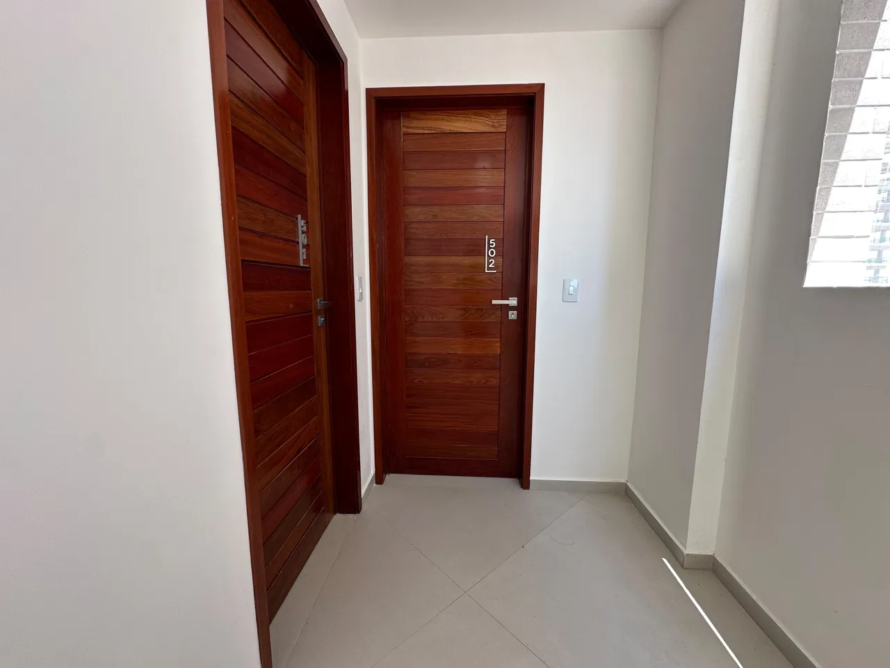 2-bedroom apartment in a building with a pool — photo 14