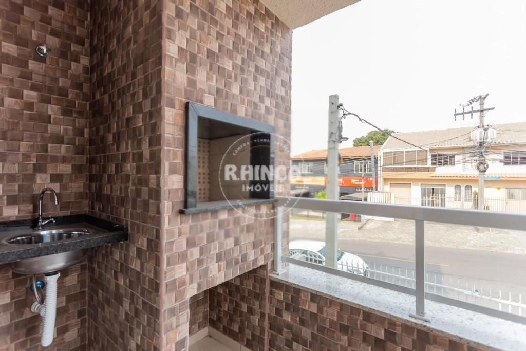 2-bedroom apartment with a grill on the balcony