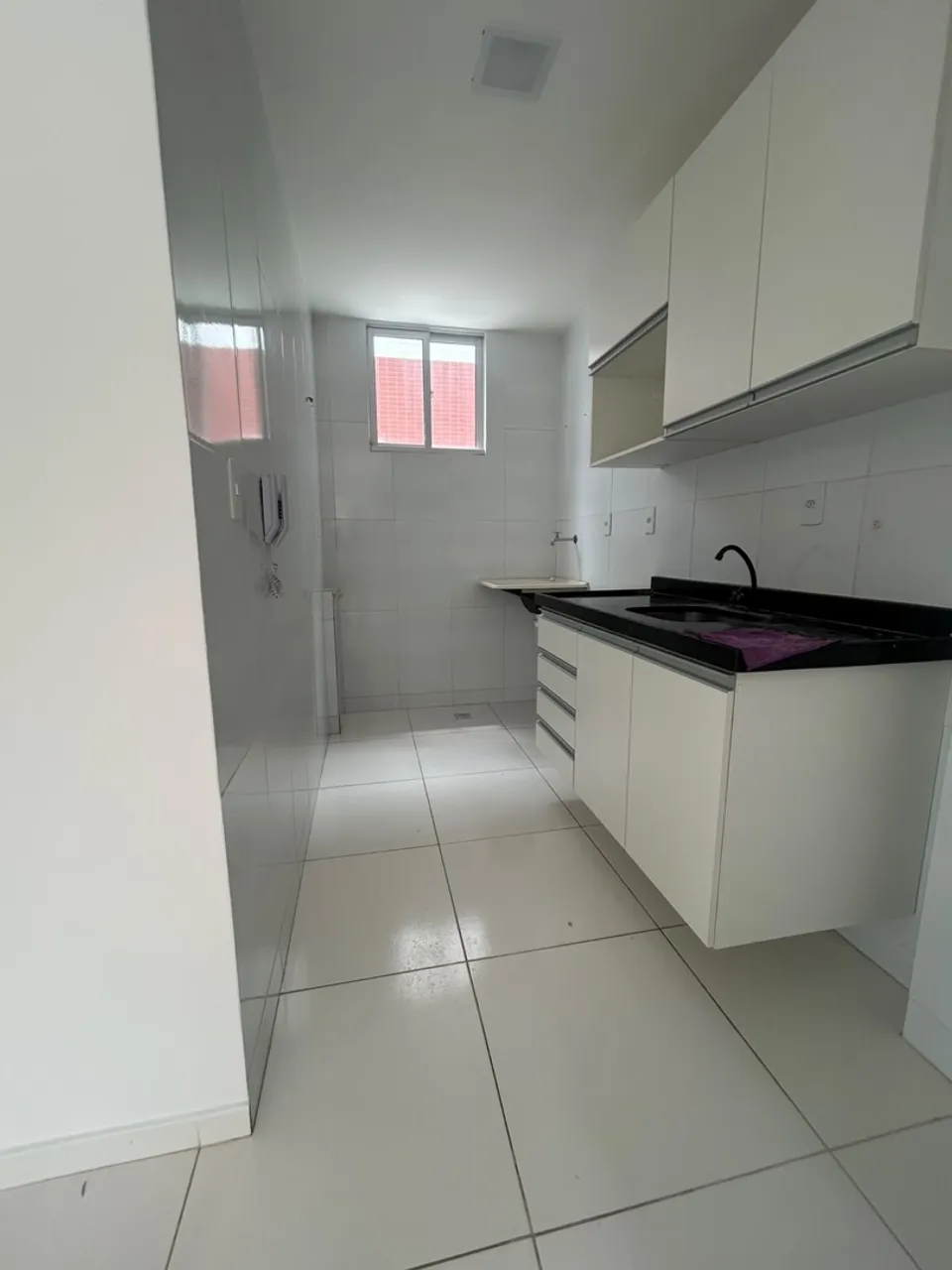 2-bedroom apartment in a building with a pool — photo 2