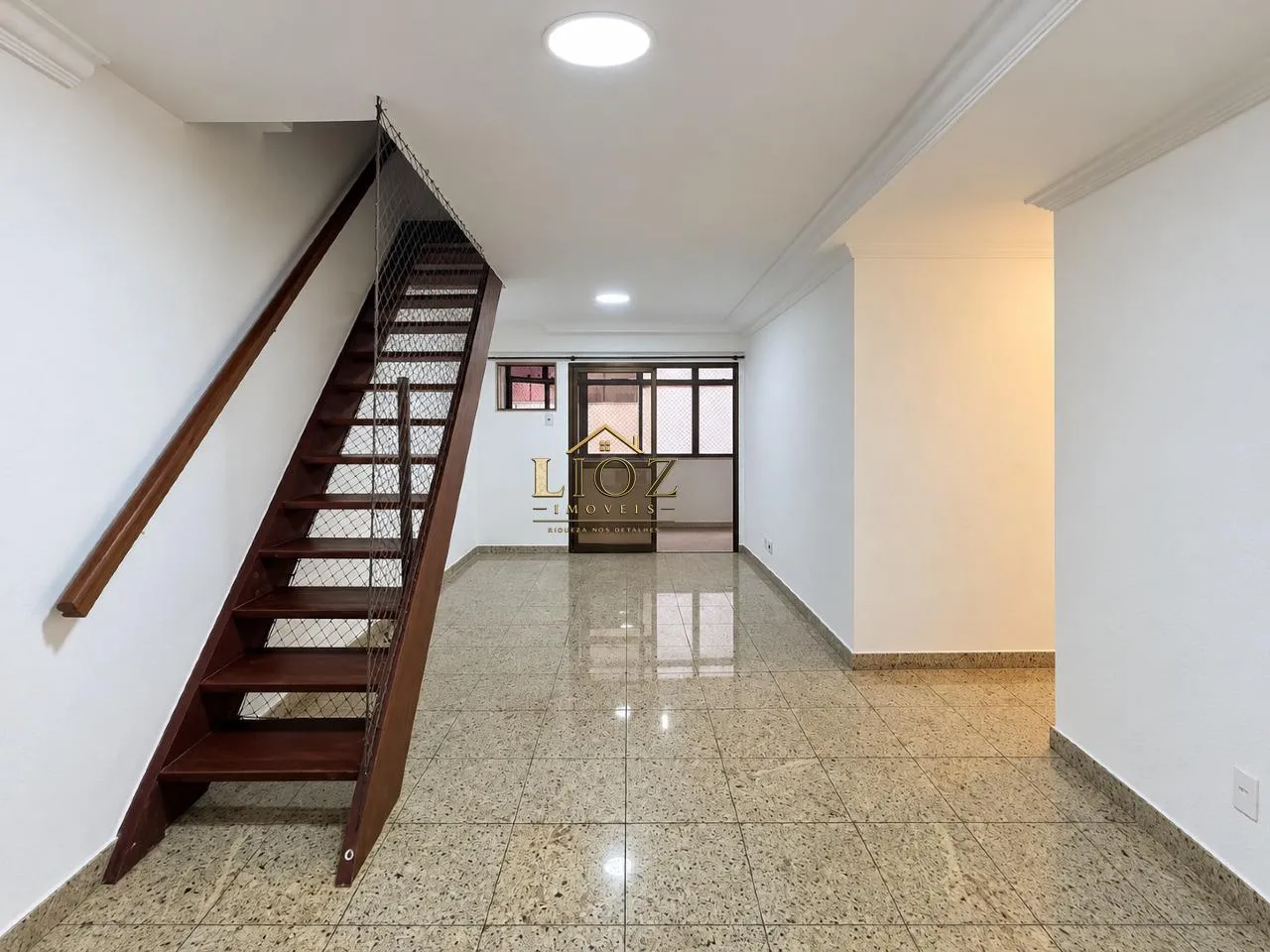 4-bedroom apartment in a building with a pool