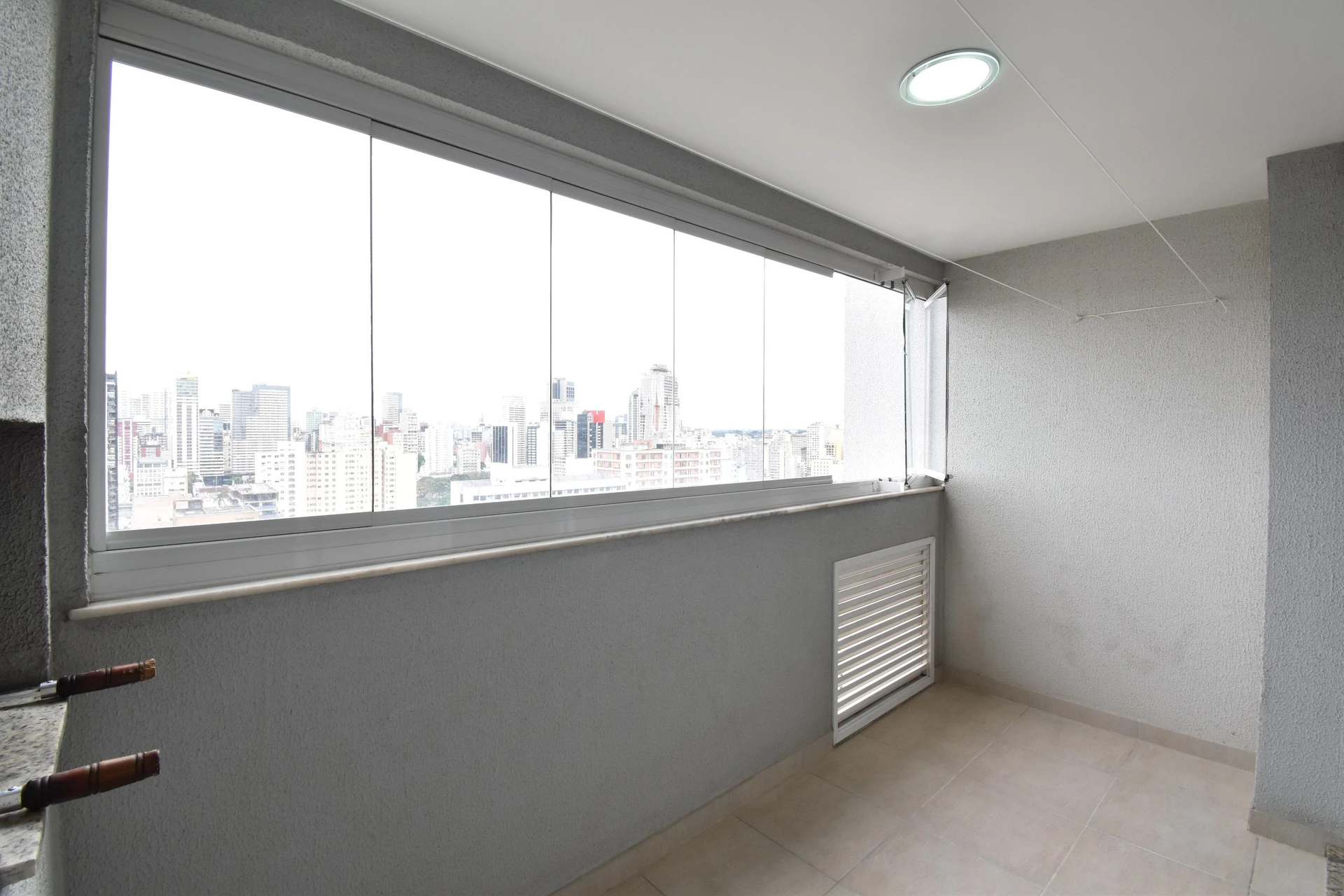 2-bedroom apartment with a grill on the balcony
