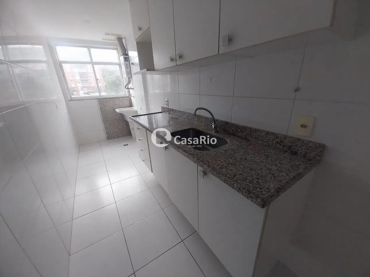2-bedroom apartment in a building with a pool — photo 12