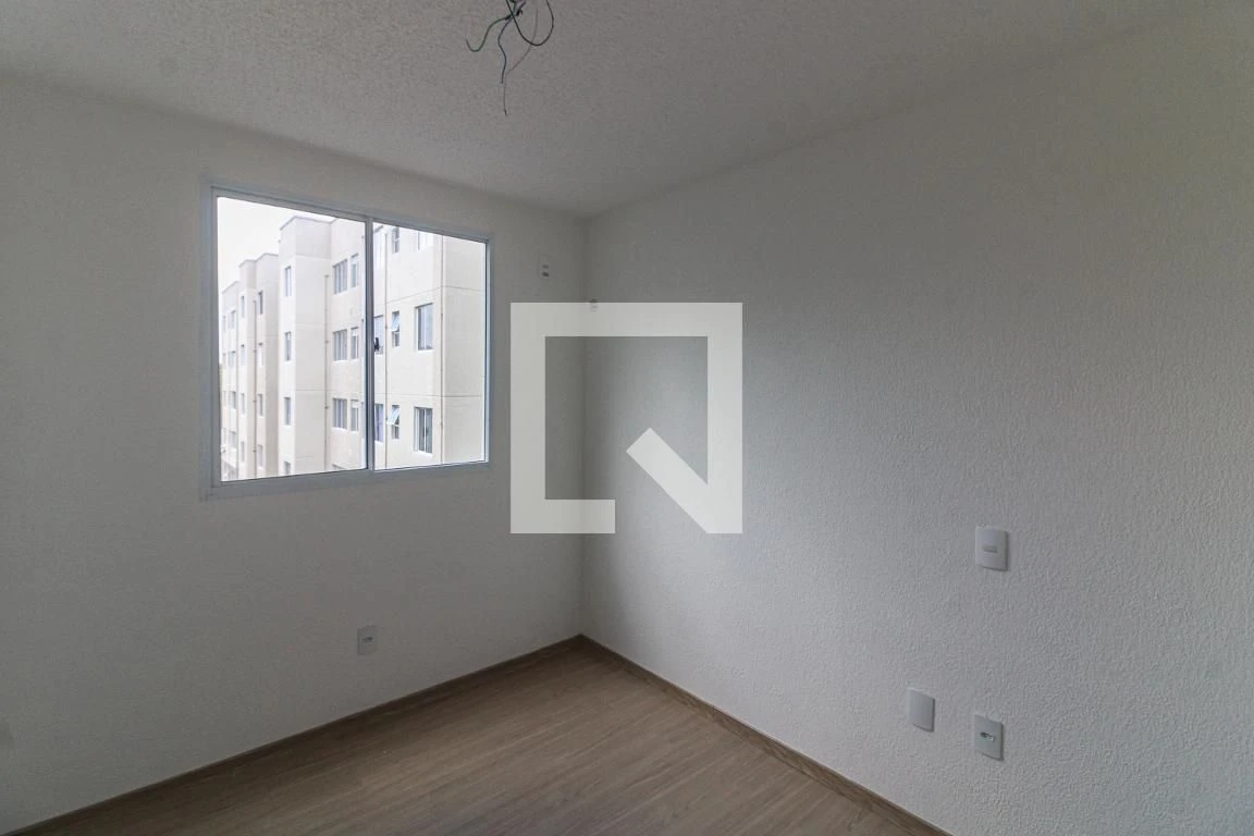 2-bedroom apartment in a building with a pool