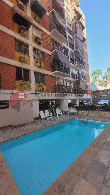 2-bedroom apartment in a building with a pool — photo 25