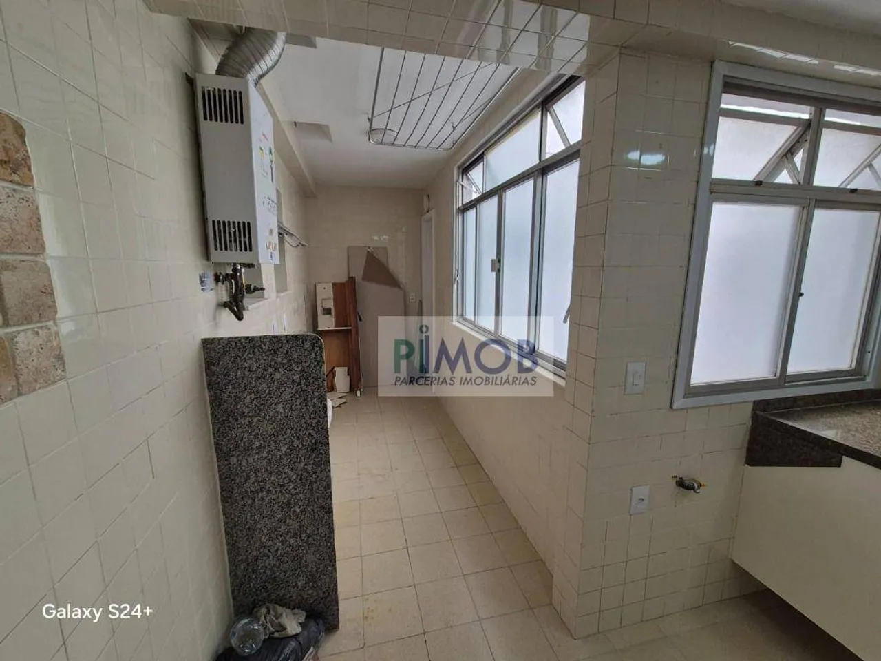 Apartamento de 2 quartos e 104 m² com área de lavanderia — photo 12