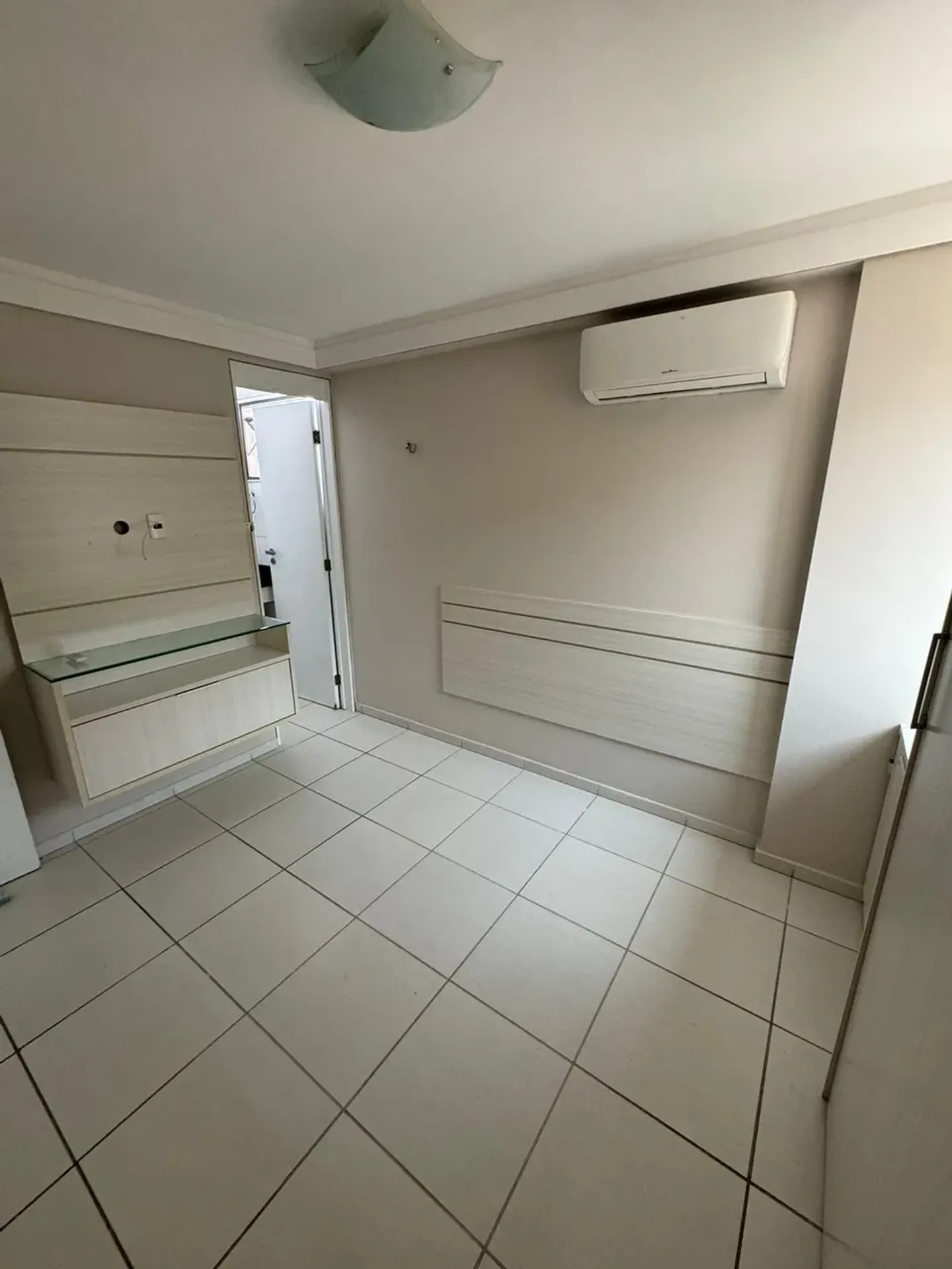 2-bedroom apartment in a building with a pool — photo 4