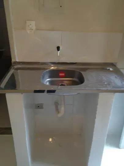 Apartamento de 1 quarto com cozinha compacta e 1 banheiro — photo 12