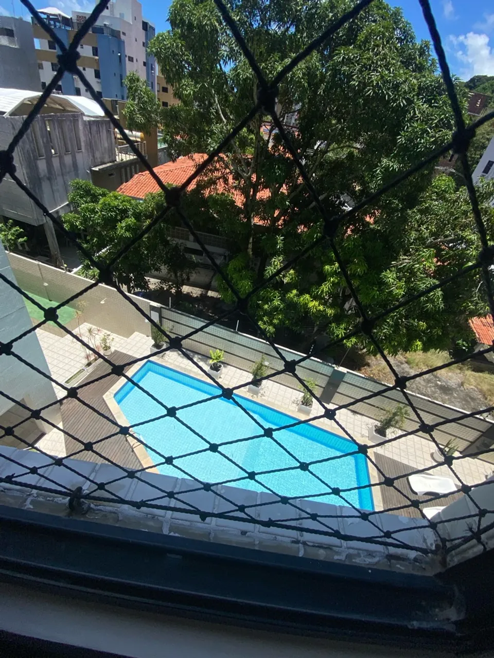 4-bedroom apartment in a building with a pool — photo 5