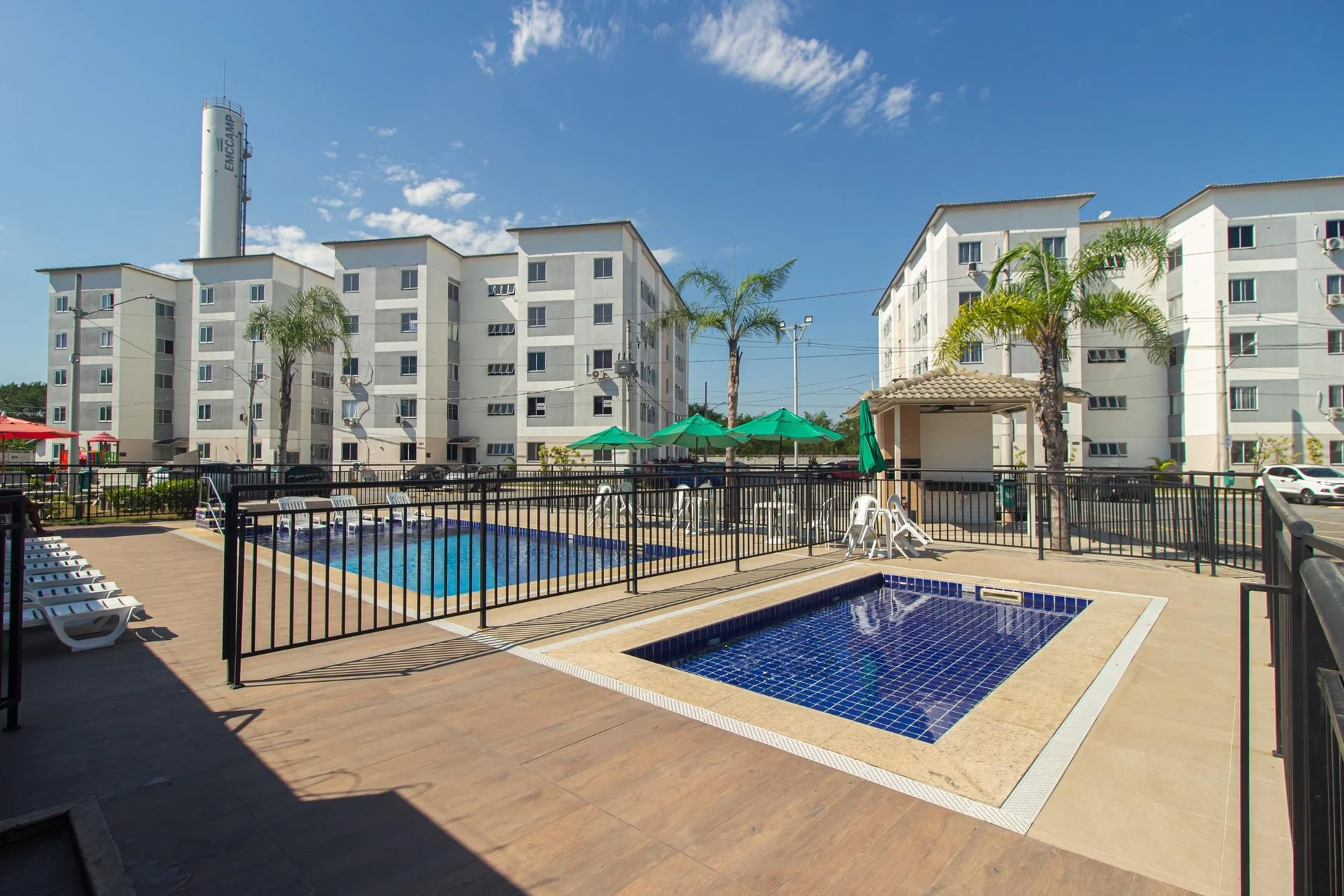 2-bedroom apartment in a building with a pool — photo 2