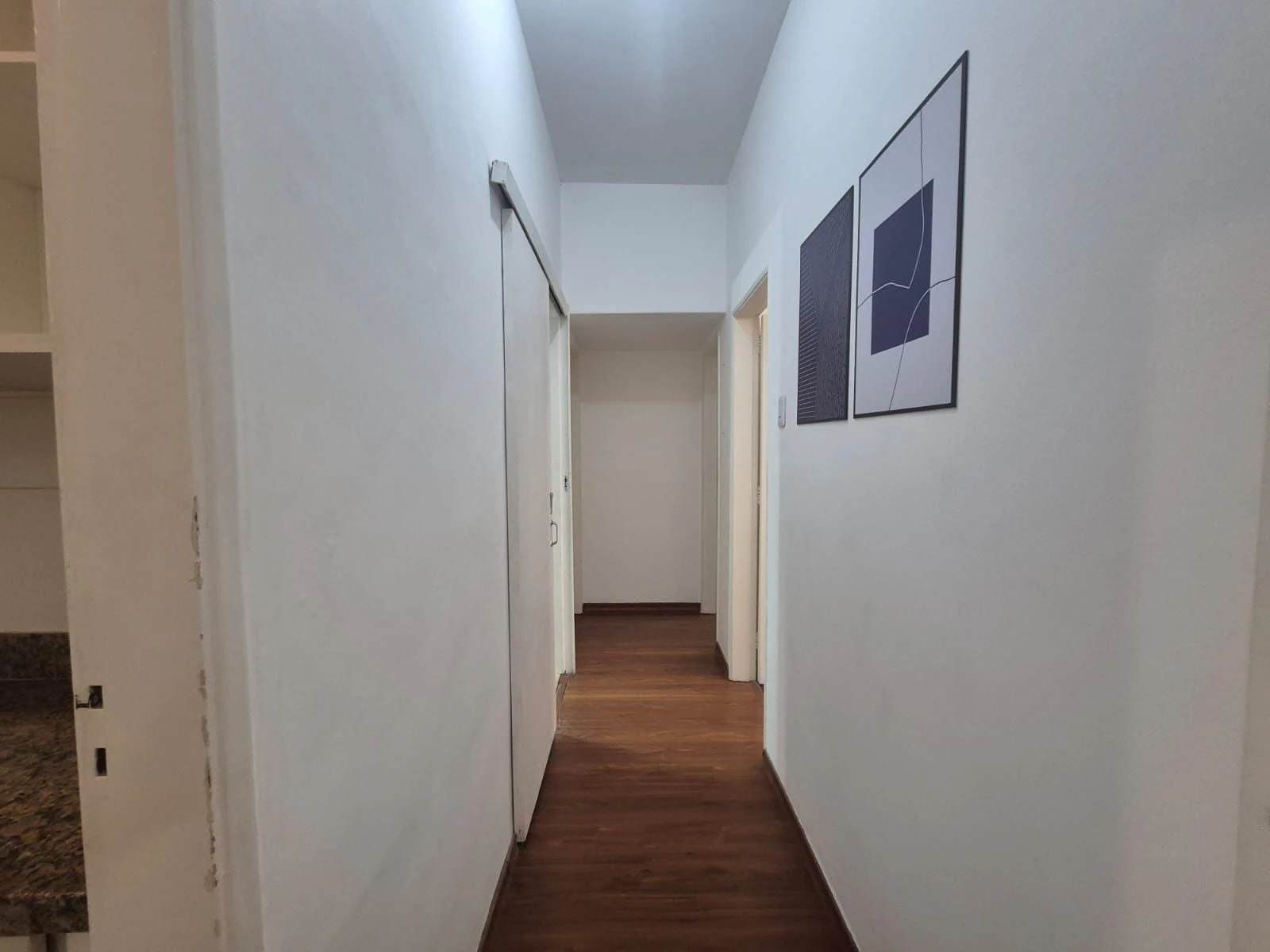 Wood or laminate floors in a 3-bedroom apartment, 100 m² — photo 13