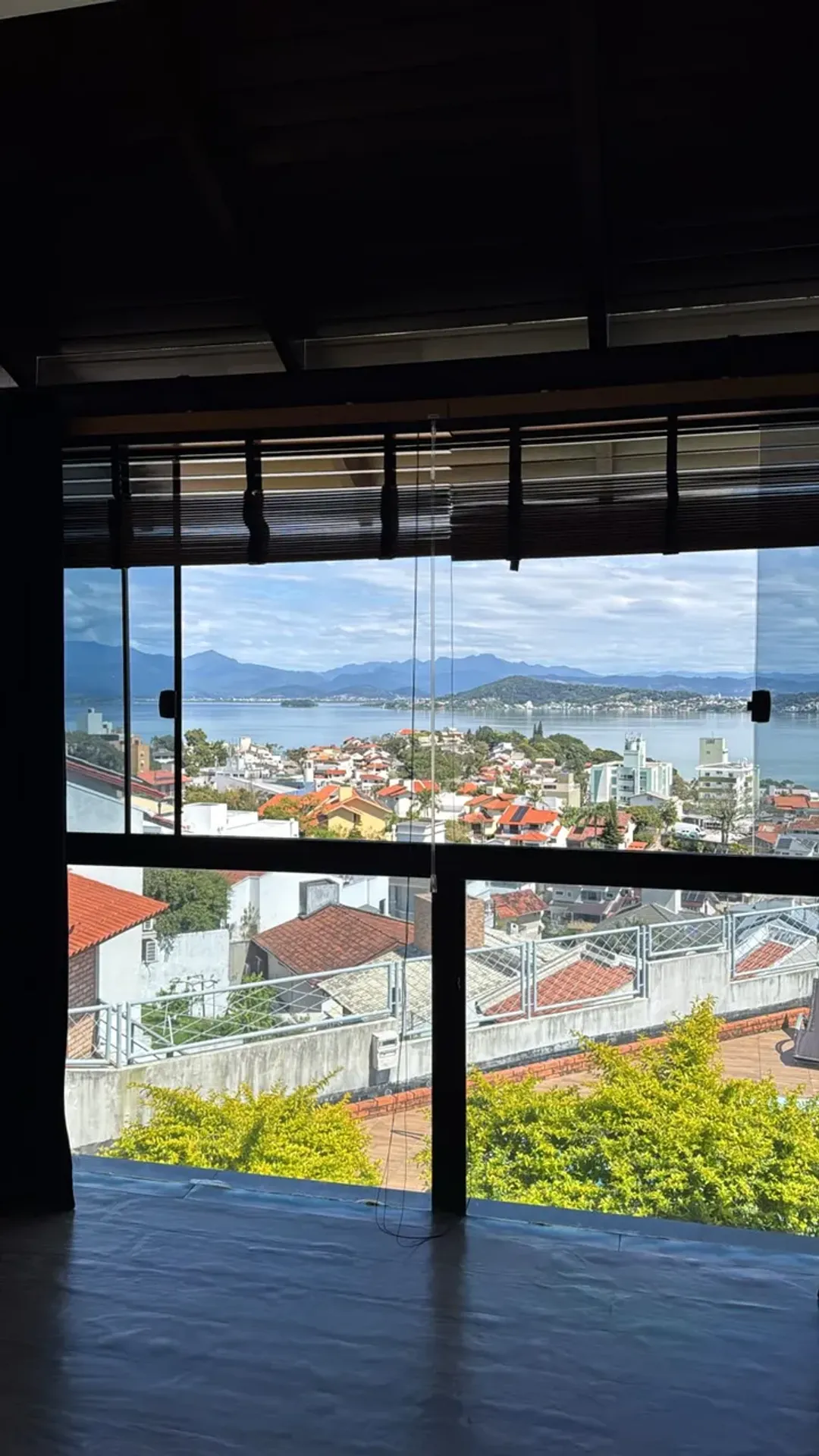 620 m² house with a glass-enclosed balcony and a water view — photo 13