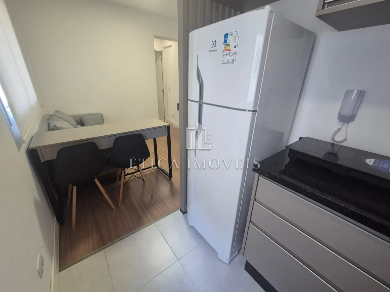 Furnished 1-bedroom apartment with an open-plan kitchen