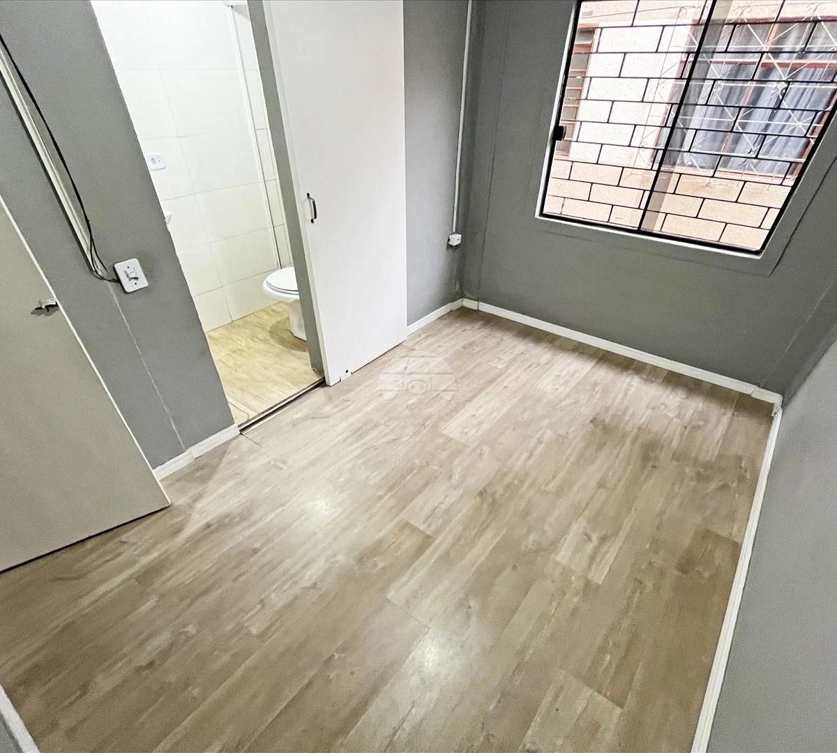 Wood or laminate floors in a 3-bedroom apartment, 48 m² — photo 6