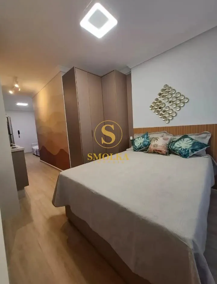 Furnished studio with integrated kitchen and glass shower — photo 6