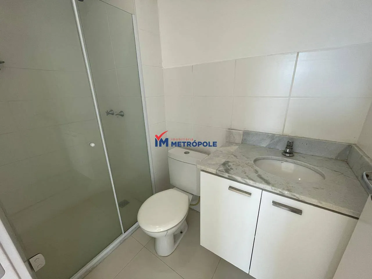 2-bedroom apartment in a building with a pool — photo 10