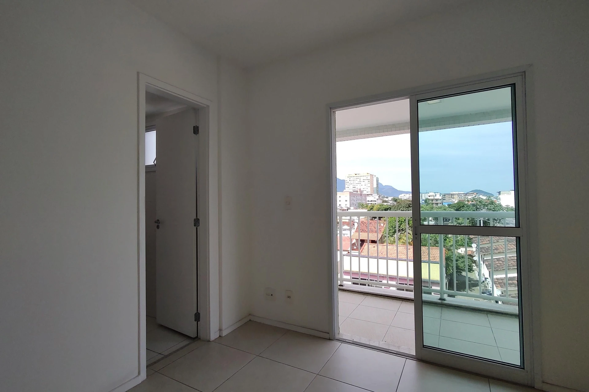 Unfurnished apartment with an open-plan kitchen and balcony — photo 24