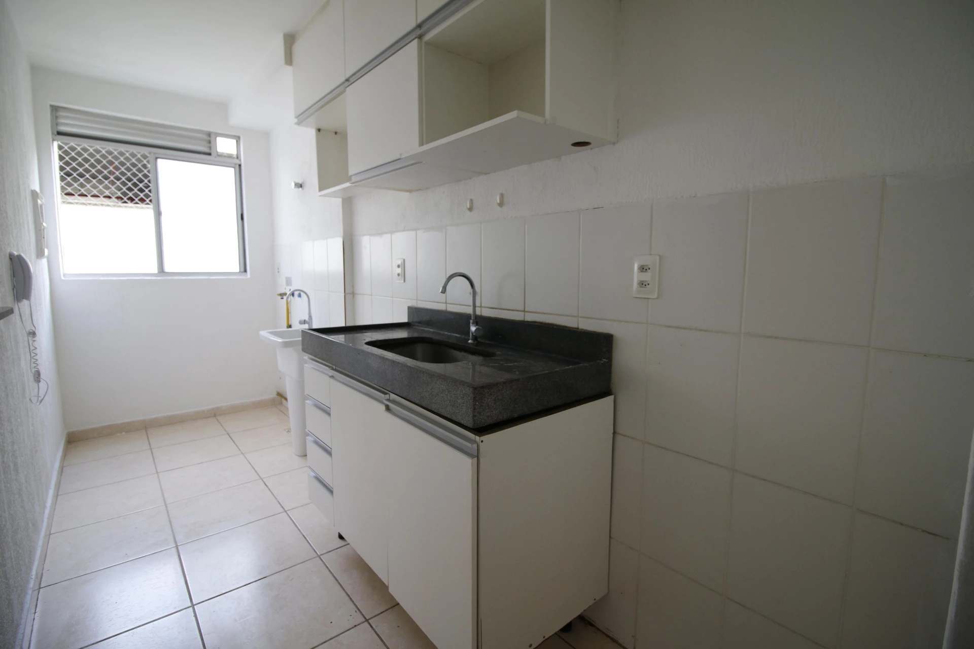 2-bedroom apartment in a building with a pool — photo 2