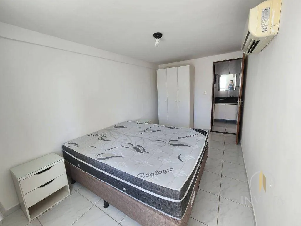 One-bedroom apartment in a building with a pool — photo 4