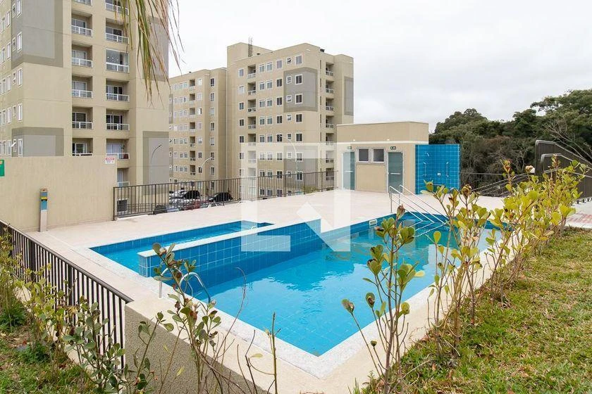 2-bedroom apartment in a building with a pool — photo 11