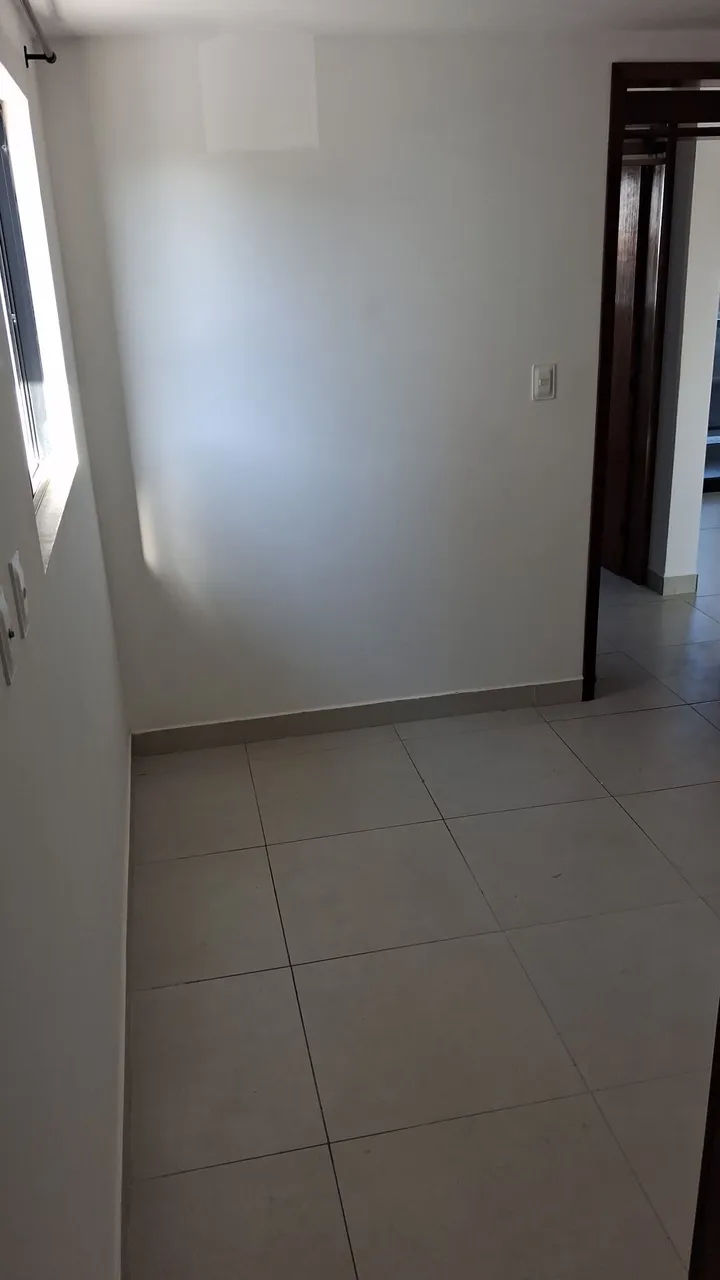2-bedroom apartment in a building with a pool — photo 13