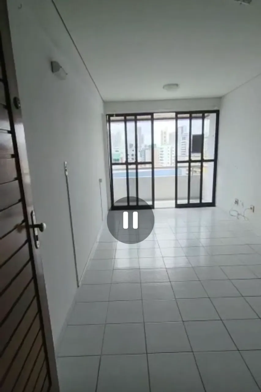 3-bedroom apartment in a building with a pool