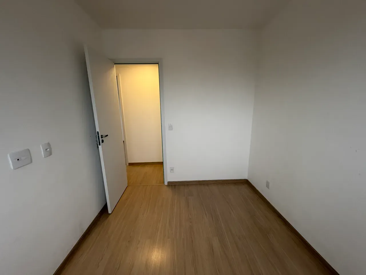 Wood or laminate floors in a 3-bedroom apartment, 69 m² — photo 17