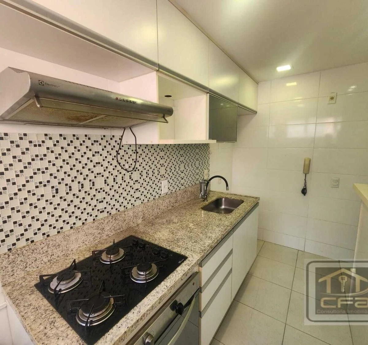 2-bedroom apartment in a building with a pool — photo 4