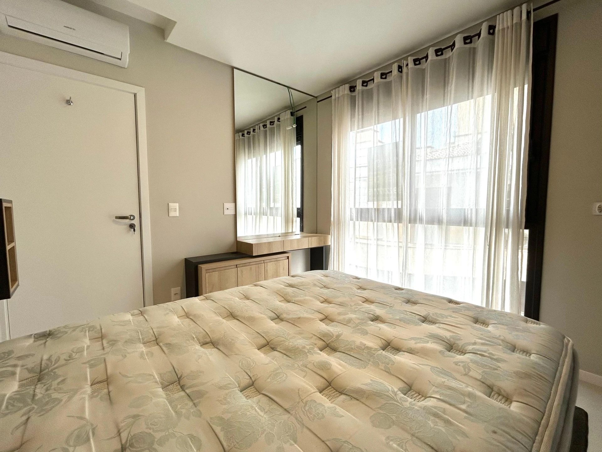 One-bedroom apartment in a building with a pool — photo 6