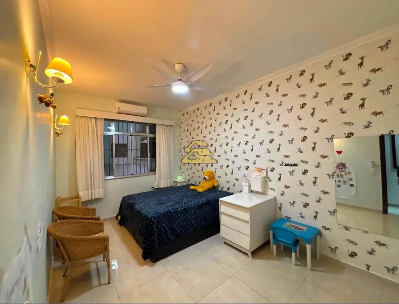 3-bedroom apartment with wall TV unit and tile floors — photo 12