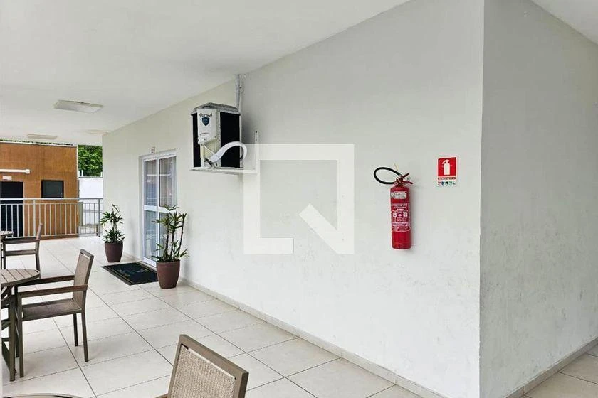 2-bedroom apartment in a building with a pool — photo 39