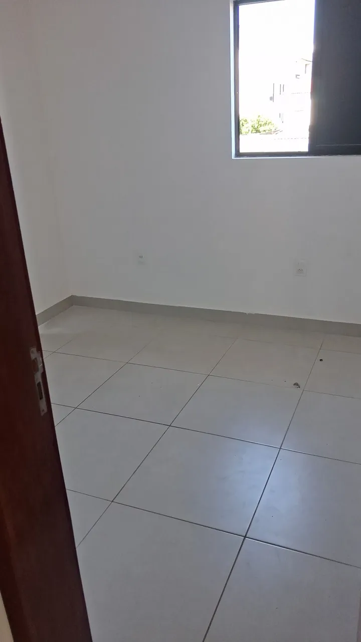 2-bedroom apartment in a building with a pool — photo 16