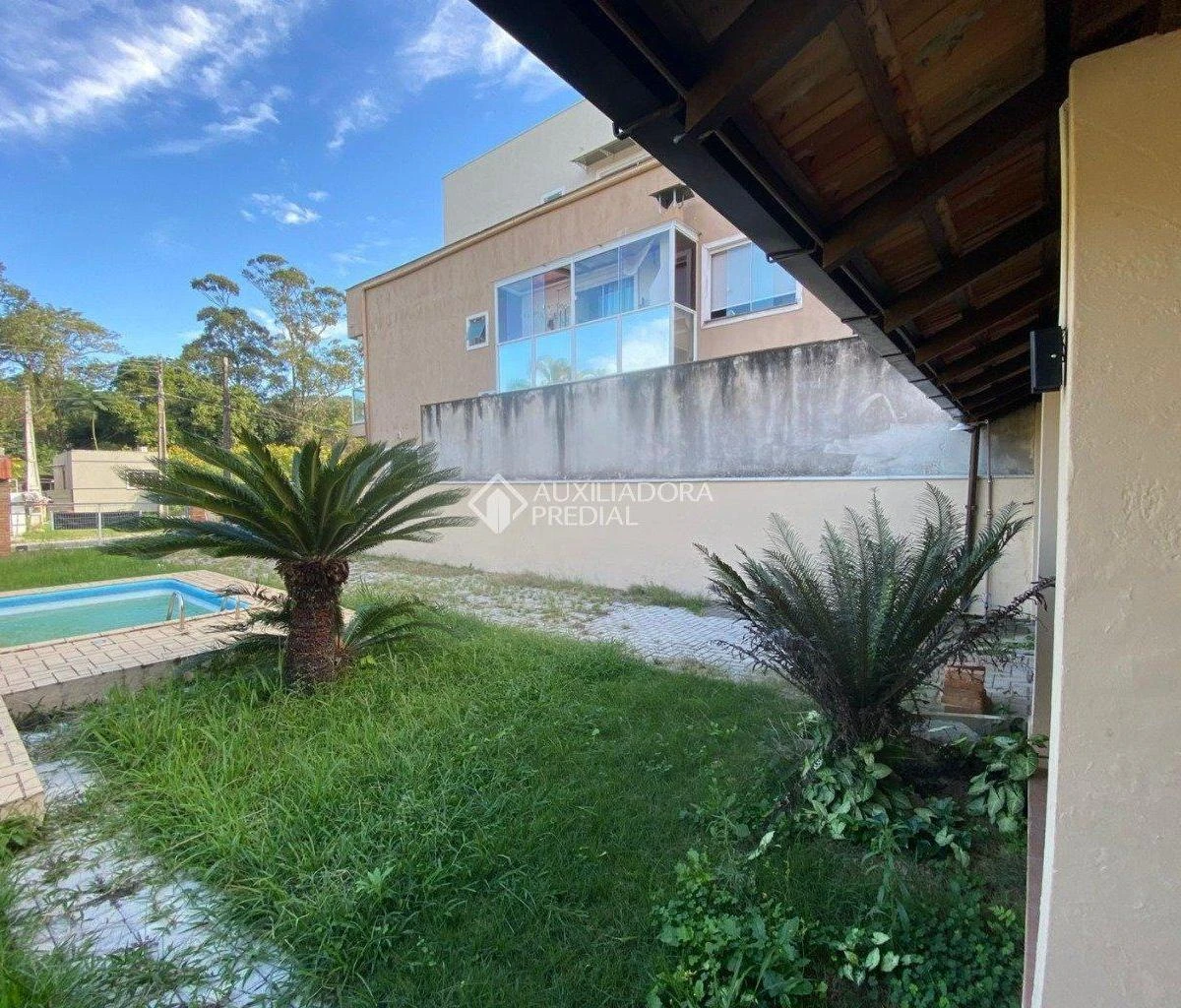 Casa de 4 dormitorios con balcón gourmet en Florianópolis — photo 13