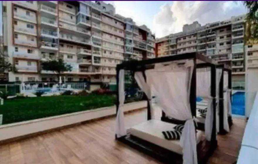2-bedroom apartment with a closed kitchen and balcony — photo 9
